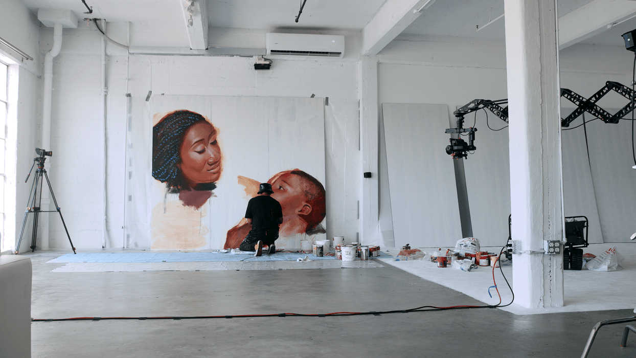 Graffiti-artist-Robert-Vargas-Pre-Painting-Wall-Panels-For-A-Mural-painting-in-Studio-A-Apex-Photo-Studios-sunrise-studio-with-jib-in-frame