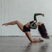 Contemporary dancer performing a dynamic pose in Sunrise Studio at Apex Photo Studios' Studio D