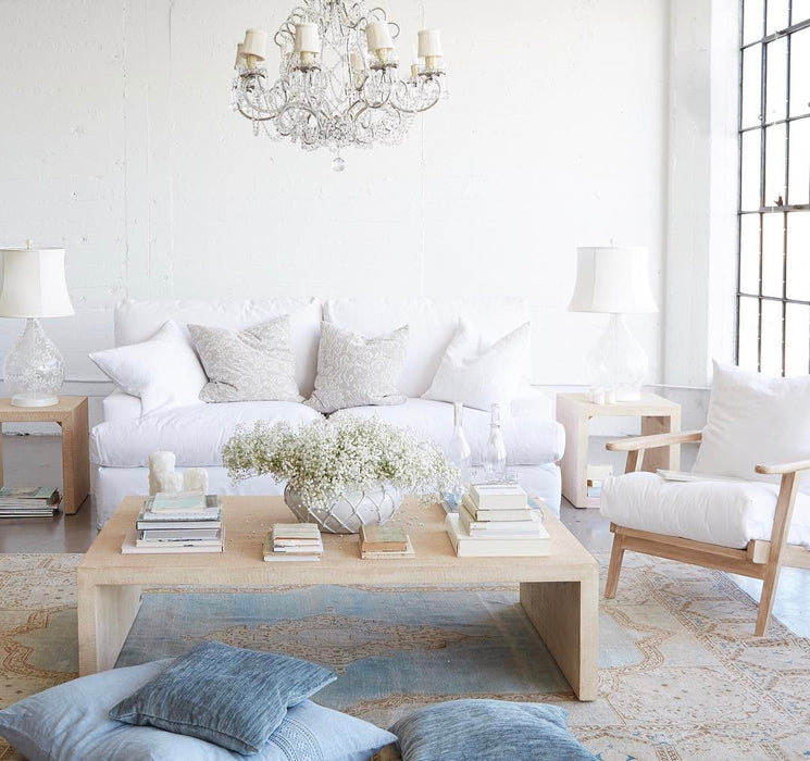 Elegantly styled living room with natural light in Sunrise Studio at Apex Photo Studios' Studio D