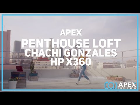 Chachi Gonzales dancing on Apex Penthouse loft rooftop