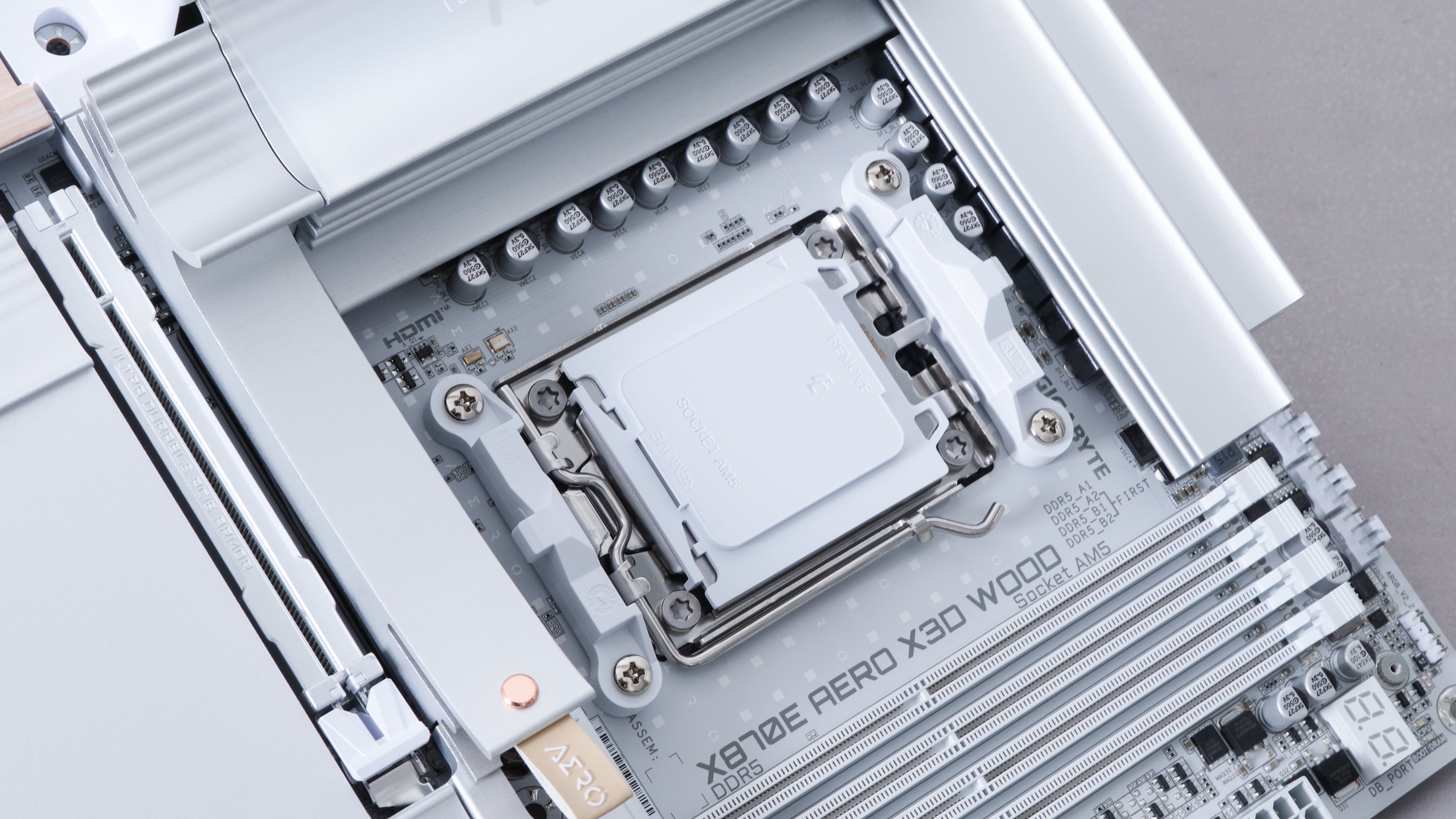 apex photo studios close up of Chip cover on X870E AERO X3D wood motherboard