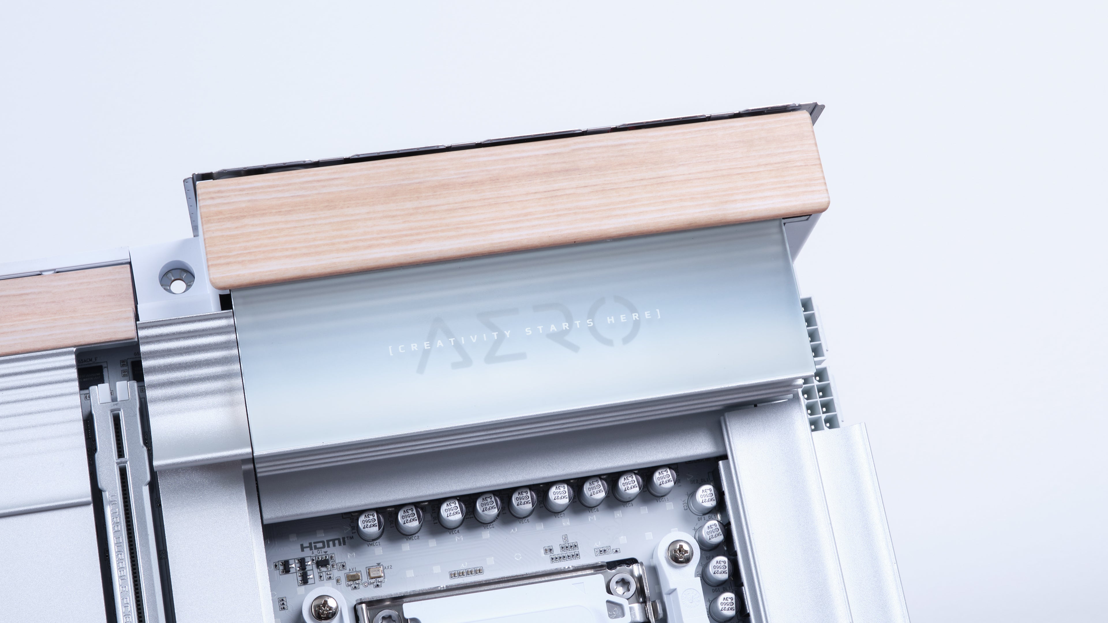 apex photo studios close up of AERO branding with wood decal on X870E AERO X3D Motherboard