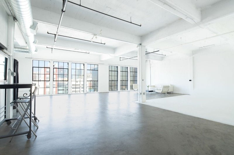 Daylight Photo Studio with floor to ceiling windows in downtown los angeles. Available to rent through Apex Photo Studios.