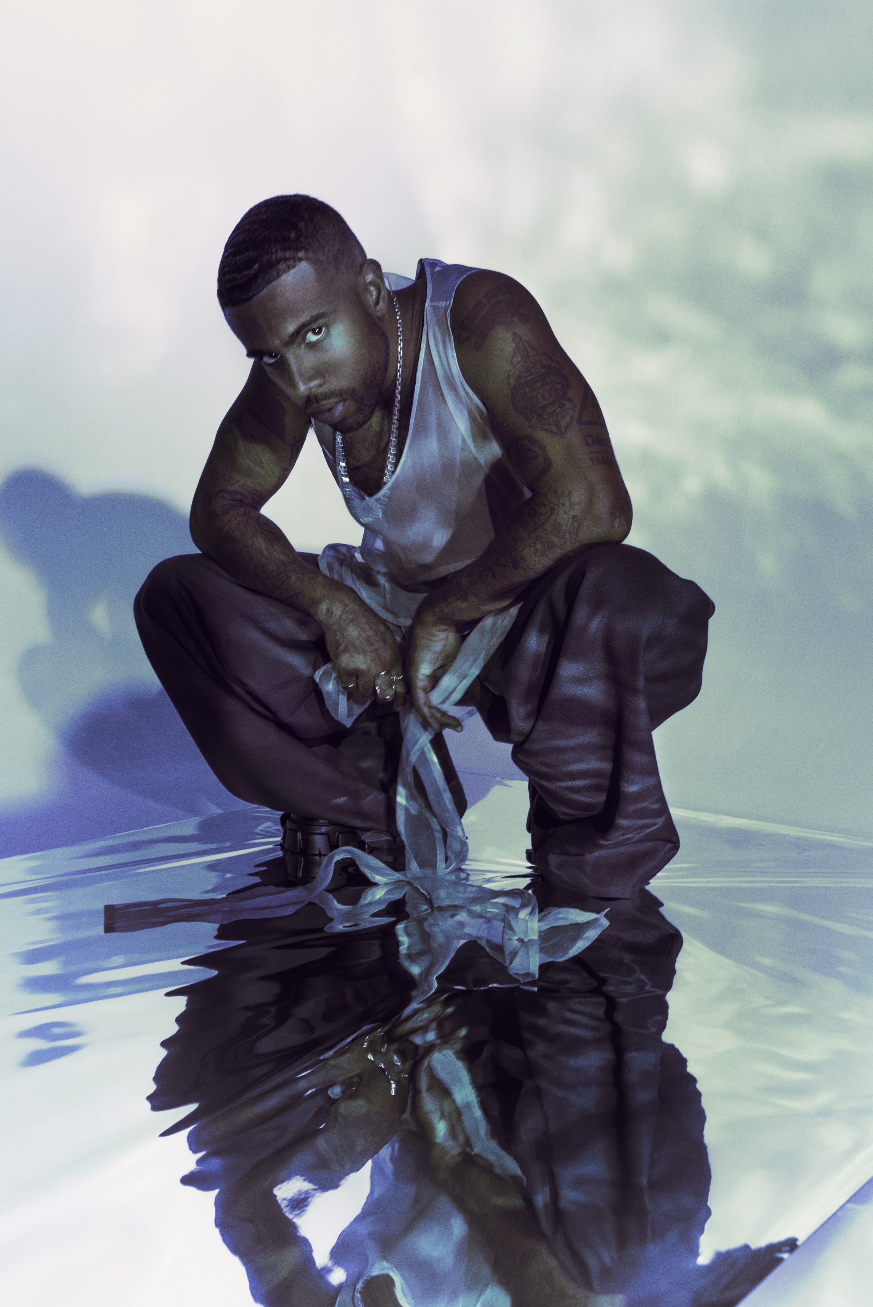 Vic Mensa posing for photograph. Shot by Colt Grice. Apex Photo Studios