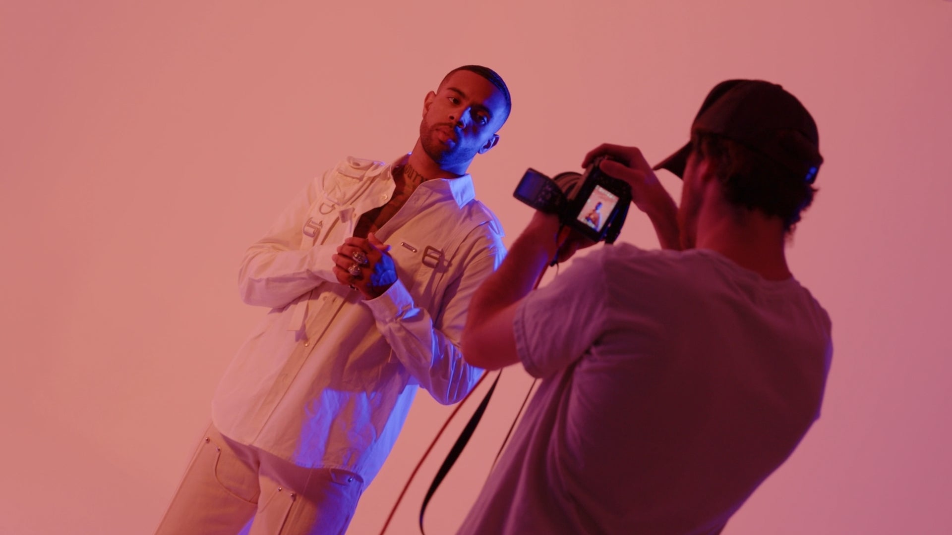 Image of someone taking a photo of Vic Mensa. Shot At apex photo studios in downtown los angeles.
